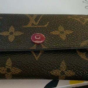 SOLD Authentic Louis Vuitton key wallet